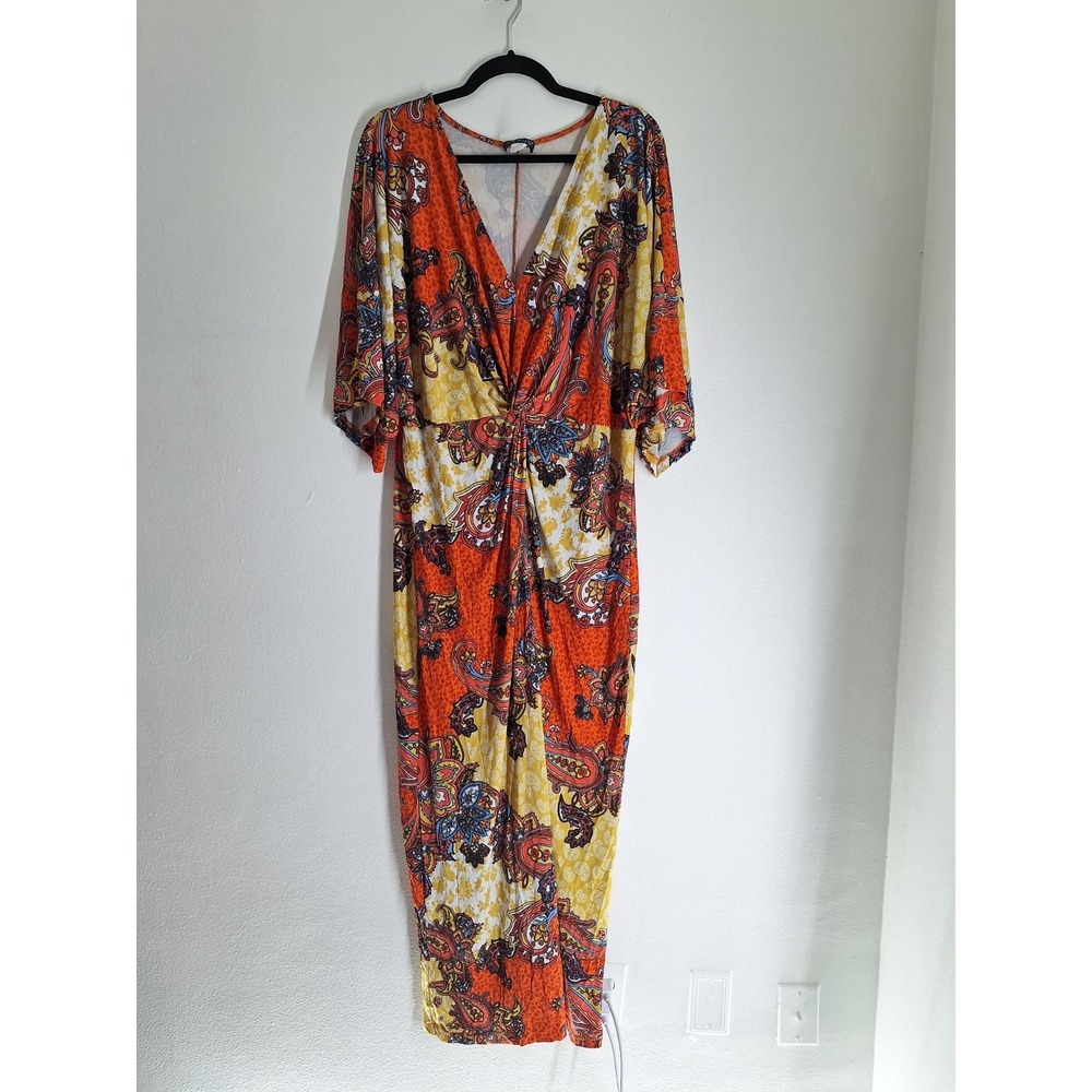 A VENUS Twist Front Maxi Dress featuring a paisley-inspired boho print
